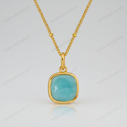 Gold plated chain necklace with a amazonite blue stone pendant 